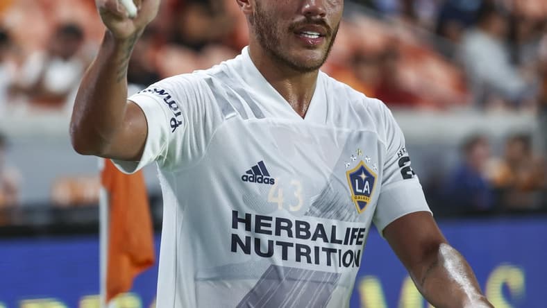 Oct 20, 2021; Houston, Texas, USA; LA Galaxy midfielder Jonathan dos Santos (8) walks off the field during the second half against the Houston Dynamo FC at PNC Stadium. Mandatory Credit: Troy Taormina-USA TODAY Sports