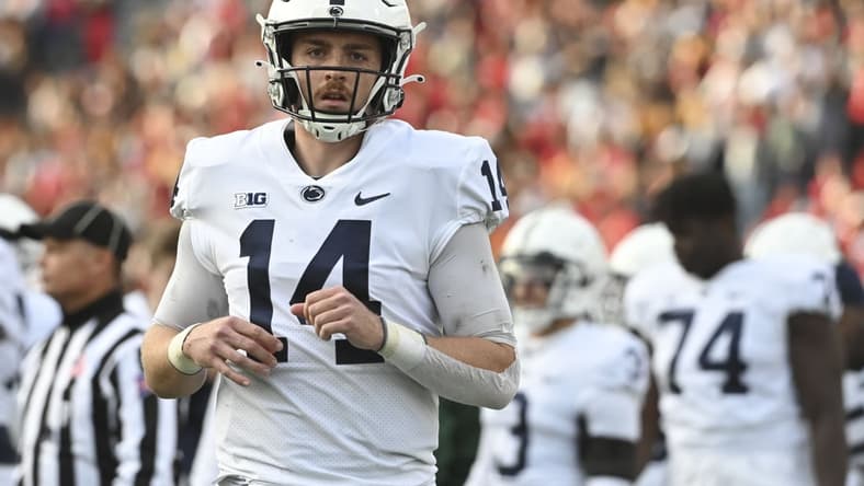 Nov 6, 2021; College Park, Maryland, USA;  Penn State Nittany Lions quarterback Sean Clifford (14) stands on the field during the first half against the Maryland Terrapins at Capital One Field at Maryland Stadium. Mandatory Credit: Tommy Gilligan-USA TODAY Sports