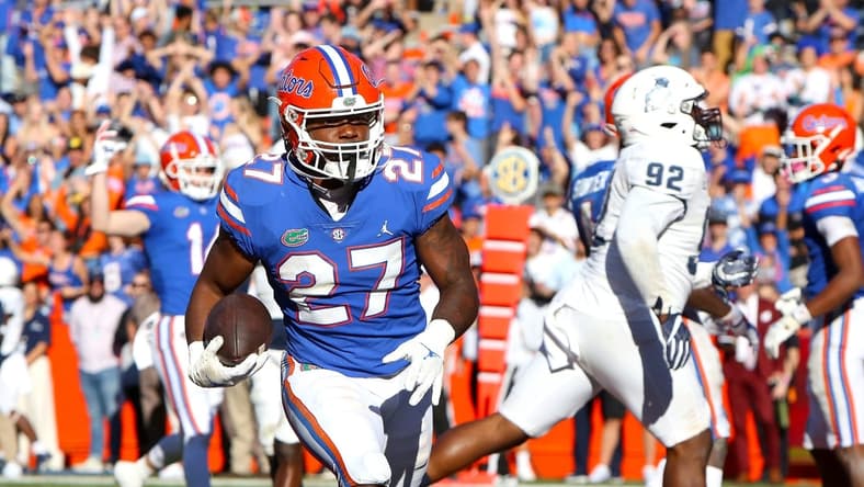 Florida Gators running back Dameon Pierce (27) scores a touchdown during a football game against Samford University, at Ben Hill Griffin Stadium in Gainesville Fla. Nov. 13, 2021.

Flgai Ufvssamford Action21