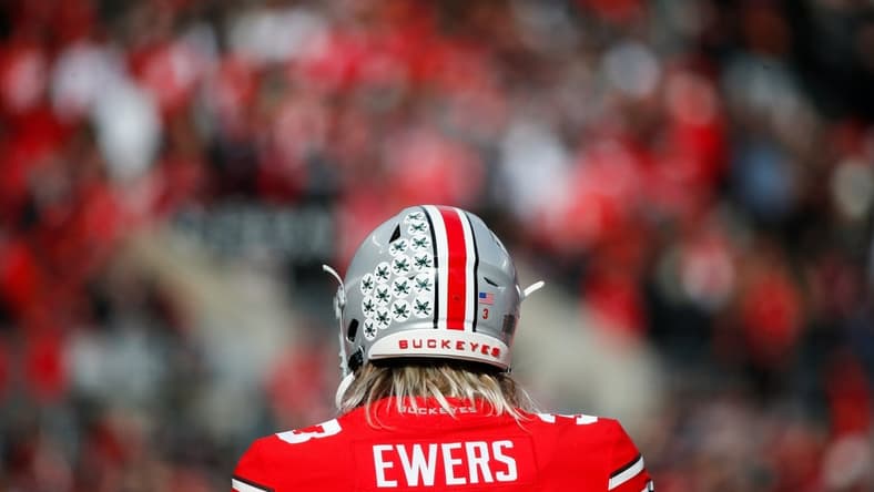 Sat., Nov. 20, 2021; Columbus, Ohio, USA; Ohio State Buckeyes quarterback Quinn Ewers (3) practices on the sideline during a break in play in the second quarter of a NCAA Division I football game between the Ohio State Buckeyes and the Michigan State Spartans at Ohio Stadium. Mandatory Credit: Joshua A. Bickel/Columbus Dispatch via USA TODAY Network.

Cfb Michigan State Spartans At Ohio State Buckeyes