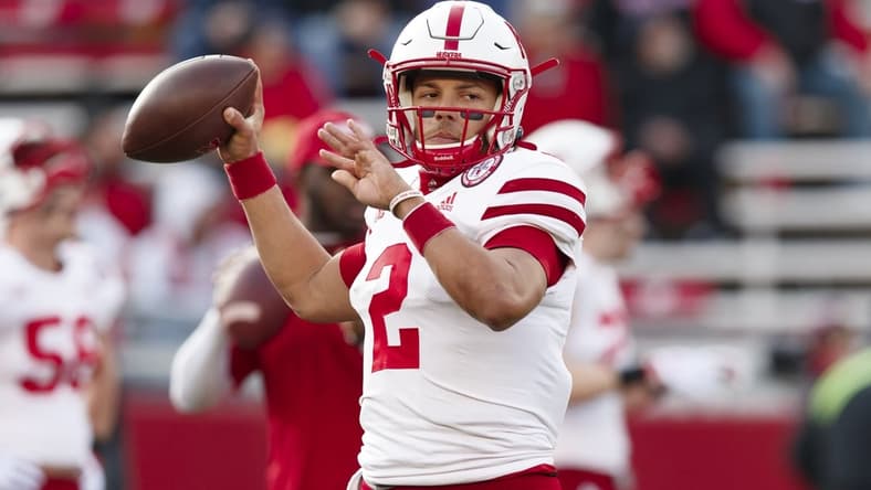 Nov 20, 2021; Madison, Wisconsin, USA;  Nebraska Cornhuskers quarterback Adrian Martinez (2) throws a pass during warmups prior to the game against the Wisconsin Badgers at Camp Randall Stadium. Mandatory Credit: Jeff Hanisch-USA TODAY Sports