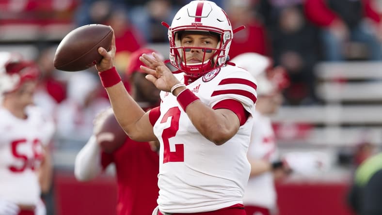 Nov 20, 2021; Madison, Wisconsin, USA;  Nebraska Cornhuskers quarterback Adrian Martinez (2) throws a pass during warmups prior to the game against the Wisconsin Badgers at Camp Randall Stadium. Mandatory Credit: Jeff Hanisch-USA TODAY Sports