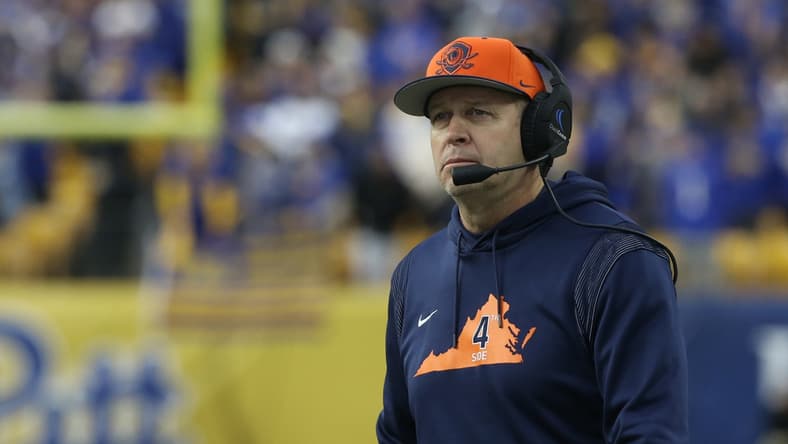 Nov 20, 2021; Pittsburgh, Pennsylvania, USA;  Virginia Cavaliers head coach Bronco Mendenhall looks on from the sidelines against the Pittsburgh Panthers during the second quarter at Heinz Field. Mandatory Credit: Charles LeClaire-USA TODAY Sports