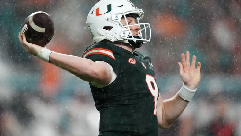 Nov 20, 2021; Miami Gardens, Florida, USA; Miami Hurricanes quarterback Tyler Van Dyke (9) attempts a pass against the Virginia Tech Hokies during the second half at Hard Rock Stadium. Mandatory Credit: Jasen Vinlove-USA TODAY Sports