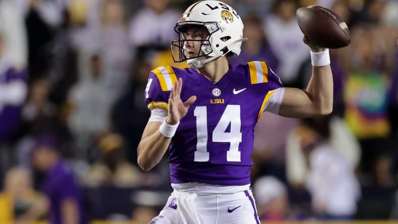Nov 20, 2021; Baton Rouge, Louisiana, USA; LSU Tigers quarterback Max Johnson (14) passes the ball against Louisiana Monroe Warhawks during the first half at Tiger Stadium. Mandatory Credit: Stephen Lew-USA TODAY Sports