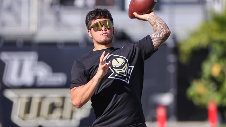 Nov 26, 2021; Orlando, Florida, USA; UCF Knights quarterback Dillon Gabriel (11) throws before the game against the South Florida Bulls at Bounce House. Mandatory Credit: Mike Watters-USA TODAY Sports