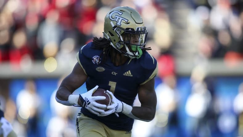 Nov 27, 2021; Atlanta, Georgia, USA; Georgia Tech Yellow Jackets running back Jahmyr Gibbs (1) runs the ball against the Georgia Bulldogs in the first quarter at Bobby Dodd Stadium. Mandatory Credit: Brett Davis-USA TODAY Sports