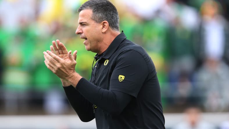 Oregon head coach Mario Cristobal oversees warmups before the game against Oregon State.

Eug 111427 Uofb 02