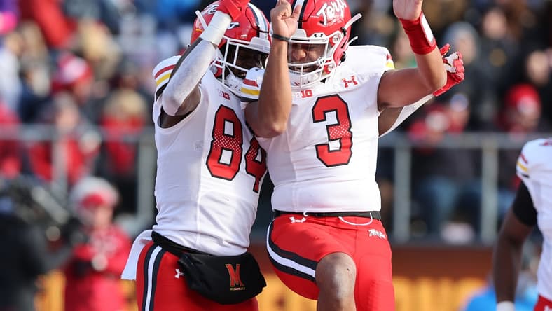 Nov 27, 2021; Piscataway, New Jersey, USA; Maryland Terrapins tight end Corey Dyches (84) celebrates his touchdown with quarterback Taulia Tagovailoa (3) during the second half against the Rutgers Scarlet Knights at SHI Stadium. Mandatory Credit: Vincent Carchietta-USA TODAY Sports