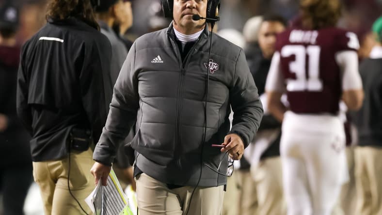 Nov 27, 2021; Baton Rouge, Louisiana, USA;  Texas A&M Aggies head coach Jimbo Fisher looks on during the first half against the LSU Tigers at Tiger Stadium. Mandatory Credit: Stephen Lew-USA TODAY Sports