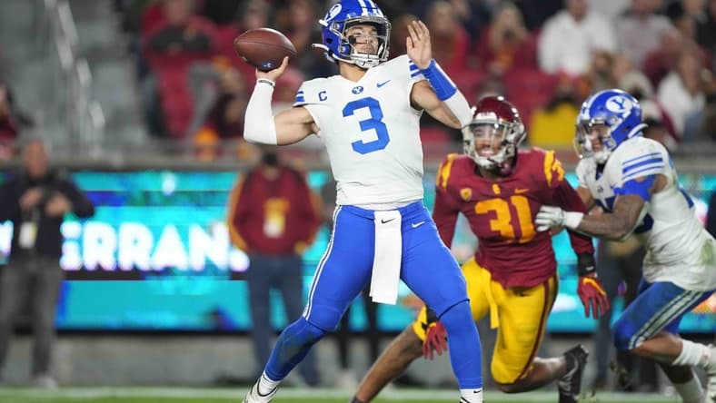 Nov 27, 2021; Los Angeles, California, USA; BYU Cougars quarterback Jaren Hall (3) throws the ball against the Southern California Trojans in the first half at United Airlines Field at Los Angeles Memorial Coliseum. Mandatory Credit: Kirby Lee-USA TODAY Sports