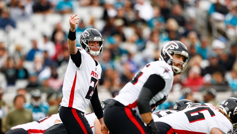 Nov 28, 2021; Jacksonville, Florida, USA; Atlanta Falcons quarterback Matt Ryan (2) calls a play at the line against the Jacksonville Jaguars in the first quarter at TIAA Bank Field. Mandatory Credit: Nathan Ray Seebeck-USA TODAY Sports