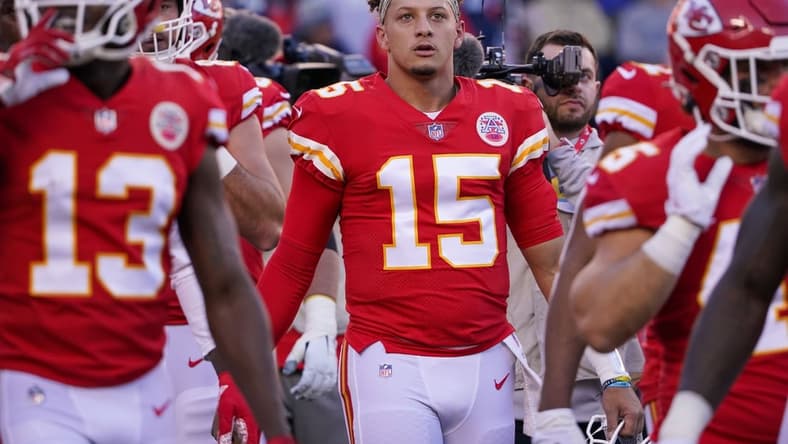 Nov 21, 2021; Kansas City, Missouri, USA; Kansas City Chiefs quarterback Patrick Mahomes (15) warms up against the Dallas Cowboys before the game at GEHA Field at Arrowhead Stadium. Mandatory Credit: Denny Medley-USA TODAY Sports