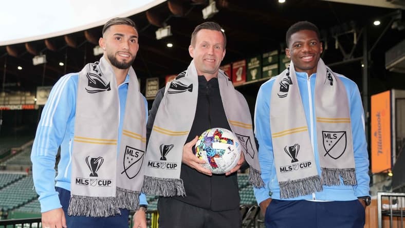 Dec 9, 2021; Portland, OR, USA; New York City FC forward Valentin Castellanos (Taty Castellanos), left, head coach Rony Della (center) and Sean Johnson pose during a press conference at Providence Park. Mandatory Credit: Kirby Lee-USA TODAY Sports