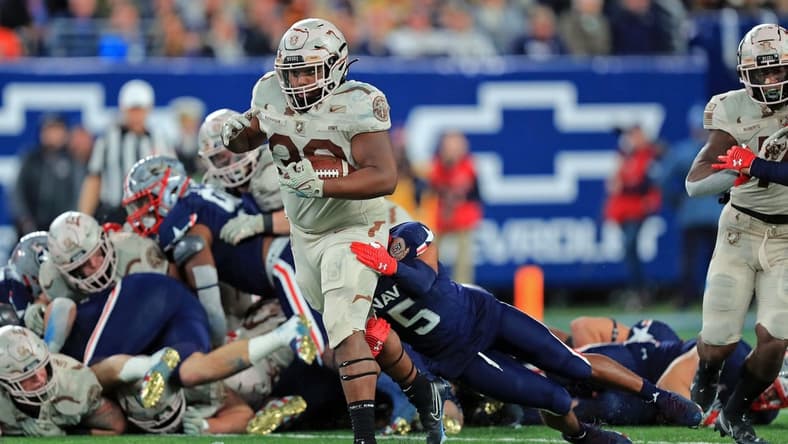 Dec 11, 2021; East Rutherford, New Jersey, USA; Army Black Knights running back Jakobi Buchanan (33) carries the ball against the Navy Midshipmen during the second half of the 122nd Army-Navy game. Mandatory Credit: Danny Wild-USA TODAY Sports