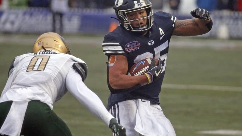 Dec 18, 2021; Shreveport, LA, USA; BYU Cougars running back Tyler Allgeier (25) runs after the catch during the first quarter against the UAB Blazers during the 2021 Independence Bowl at Independence Stadium. Mandatory Credit: Petre Thomas-USA TODAY Sports