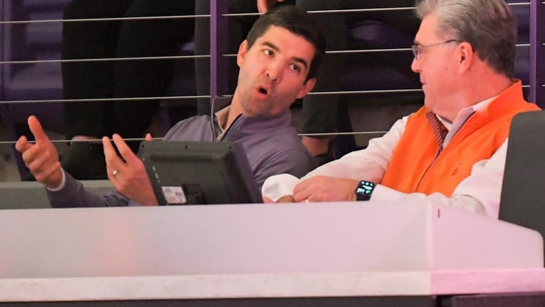 Clemson acting athletic director Graham Neff and Dan Radakovich during the first half at Littlejohn Coliseum Saturday, Dec 18, 2021.

Clemson Vs South Carolina Mbb
