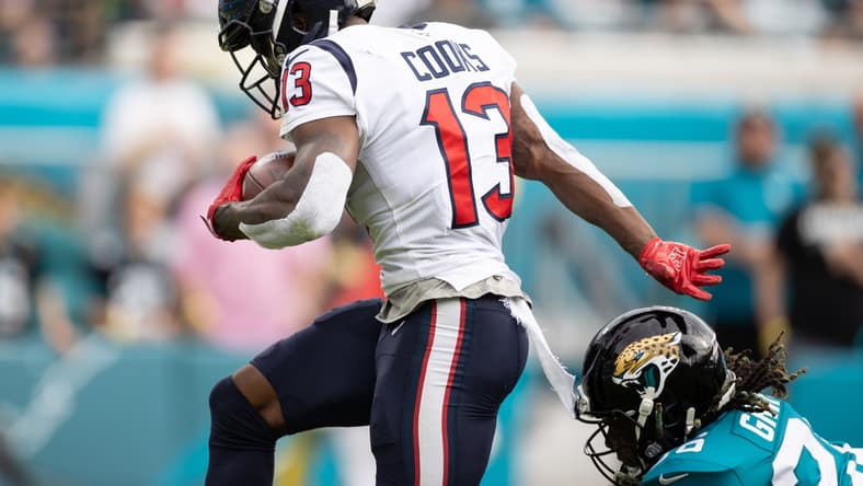 Dec 19, 2021; Jacksonville, Florida, USA; Houston Texans wide receiver Brandin Cooks (13) runs with the ball for a touchdown during the first half against the Jacksonville Jaguars at TIAA Bank Field. Mandatory Credit: Matt Pendleton-USA TODAY Sports