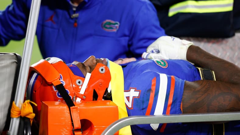 Dec 23, 2021; Tampa, FL, USA;  Florida Gators wide receiver Justin Shorter (4) is carted off the field in the second half against the UCF Knights at Raymond James Stadium. Mandatory Credit: Nathan Ray Seebeck-USA TODAY Sports