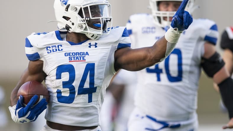Dec 25, 2021; Montgomery, AL, USA;  Georgia State Panthers safety Antavious Lane (34) returns an interception for a touchdown against Ball State in the camellia Bowl at Cramton Bowl. Mandatory Credit: Mickey Welsh-USA TODAY Sports