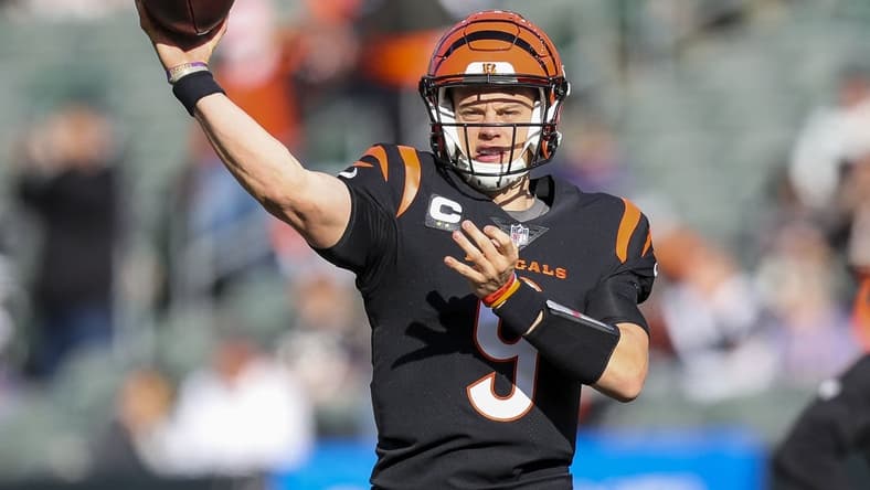 Dec 26, 2021; Cincinnati, Ohio, USA; Cincinnati Bengals quarterback Joe Burrow (9) throws a pass during warmups before a game against the Baltimore Ravens at Paul Brown Stadium. Mandatory Credit: Katie Stratman-USA TODAY Sports