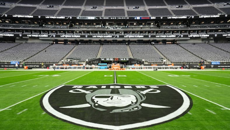 Dec 26, 2021; Paradise, Nevada, USA; A detailed view of the Las Vegas Raiders shield logo at midfield at Allegiant Stadium. Mandatory Credit: Kirby Lee-USA TODAY Sports