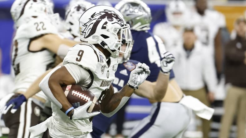 Dec 27, 2021; Detroit, MI, USA; Western Michigan Broncos running back Sean Tyler (9) returns a kickoff for a touchdown in the first half against the Nevada Wolf Pack during the 2021 Quick Lane Bowl at Ford Field. Mandatory Credit: Rick Osentoski-USA TODAY Sports