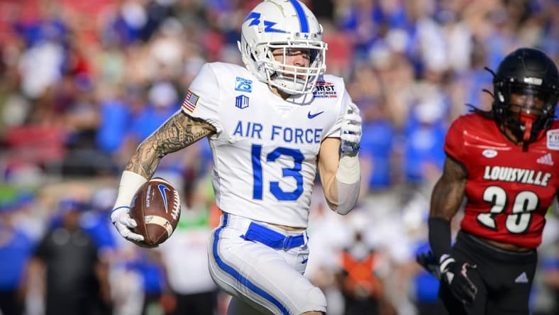 Dec 28, 2021; Dallas, Texas, USA; Air Force Falcons wide receiver Brandon Lewis (13) runs for his first of two touchdowns against the Louisville Cardinals during the first half during the 2021 First Responder Bowl at Gerald J. Ford Stadium. Mandatory Credit: Jerome Miron-USA TODAY Sports