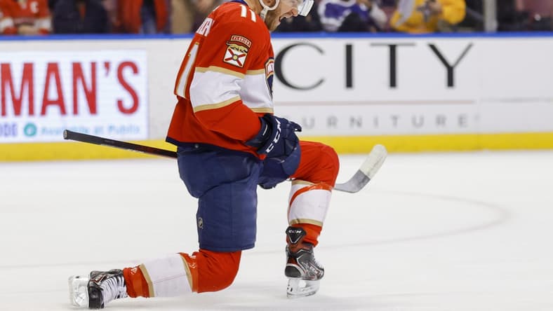 Dec 30, 2021; Sunrise, Florida, USA; Florida Panthers left wing Jonathan Huberdeau (11) celebrates after scoring against the Tampa Bay Lightning during the first period at FLA Live Arena. Mandatory Credit: Sam Navarro-USA TODAY Sports