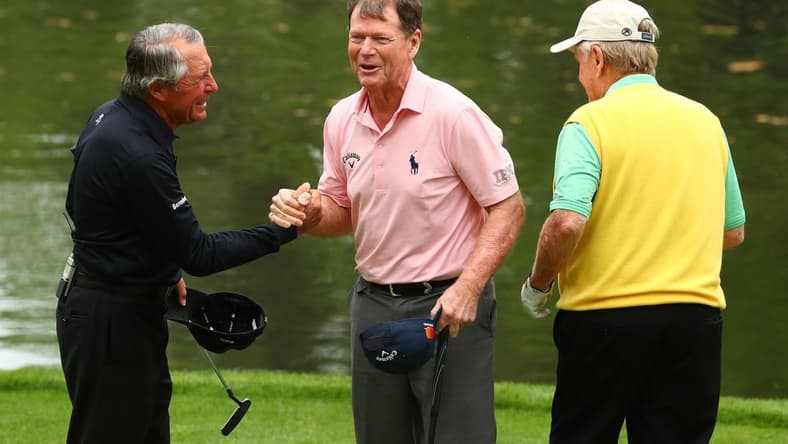Apr 4, 2018; Augusta, GA, USA; From left Gary Player , Tom Watson and Jack Nicklaus shake hands on the 9th green during the Par 3 Contest before the Masters golf tournament at Augusta National Golf Club. Mandatory Credit: Rob Schumacher-USA TODAY Sports
