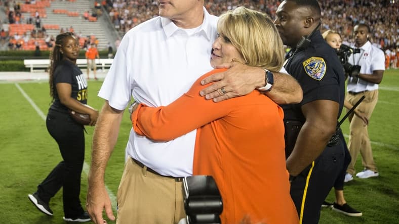 Auburn head coach Gus Malzahn hugs his wife, Kristi, after the game at Jordan-Hare Stadium in Auburn, Ala., on Saturday, Sept. 8, 2018. Auburn defeated Alabama State 63-9. 

Jc Auburnasu 63