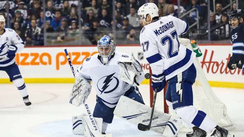 Dec 16, 2018; Winnipeg, Manitoba, CAN; Tampa Bay Lightning goalie Andrei Vasilevskiy (88) makes a save against the Winnipeg Jets during the second period at Bell MTS Place. Mandatory Credit: Terrence Lee-USA TODAY Sports