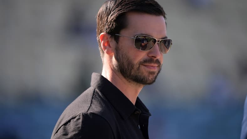 Jul 6, 2019; Los Angeles, CA, USA; Los Angeles Dodgers assistant general manager Brandon Gomes reacts before the game against the San Diego Padres at Dodger Stadium. The Padres defeated the Dodgers 3-1. Mandatory Credit: Kirby Lee-USA TODAY Sports