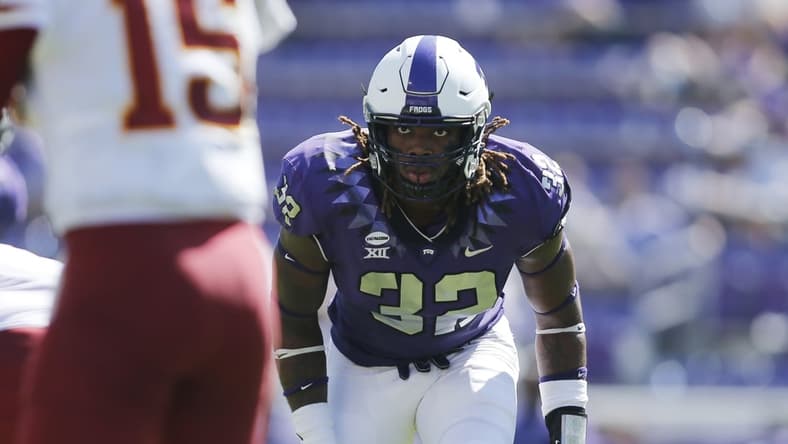 Sep 26, 2020; Fort Worth, Texas, USA; TCU Horned Frogs defensive end Ochaun Mathis (32) on the line of scrimmage in the third quarter against the Iowa State Cyclones at Amon G. Carter Stadium. Mandatory Credit: Tim Heitman-USA TODAY Sports