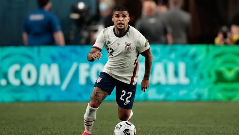 Jun 6, 2021; Denver, Colorado, USA; United States defender Deandre Yedlin (22) controls the ball in the second half against Mexico during the 2021 CONCACAF Nations League Finals soccer series final match at Empower Field at Mile High. Mandatory Credit: Isaiah J. Downing-USA TODAY Sports