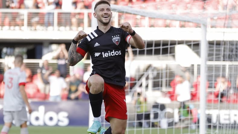 Jul 3, 2021; Washington, DC, USA; D.C. United forward Paul Arriola (7) celebrates after scoring a goal against Toronto FC in the second half at Audi Field. Mandatory Credit: Geoff Burke-USA TODAY Sports