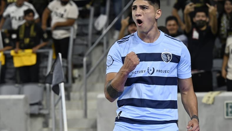 Aug 4, 2021; Los Angeles, CA, Los Angeles, CA, USA;  Sporting Kansas City forward Alan Pulido (9) celebrates after scoring a goal in the first half against Los Angeles FC at Banc of California Stadium. Mandatory Credit: Jayne Kamin-Oncea-USA TODAY Sports