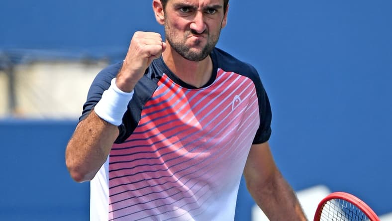 Aug 9, 2021; Toronto, Ontario, Canada; Marin Cilic of Croatia reacts to winning a point against Albert Ramos-Vinolas of Spain in first round play at Aviva Centre. Mandatory Credit: Dan Hamilton-USA TODAY Sports