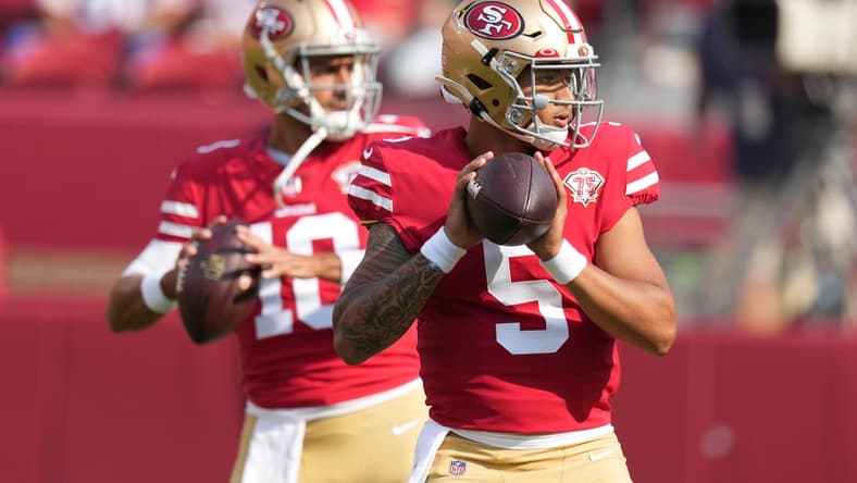 August 14, 2021; Santa Clara, California, USA; San Francisco 49ers quarterback Trey Lance (5) and quarterback Jimmy Garoppolo (10) warm up before the game against the Kansas City Chiefs at Levi's Stadium. Mandatory Credit: Kyle Terada-USA TODAY Sports