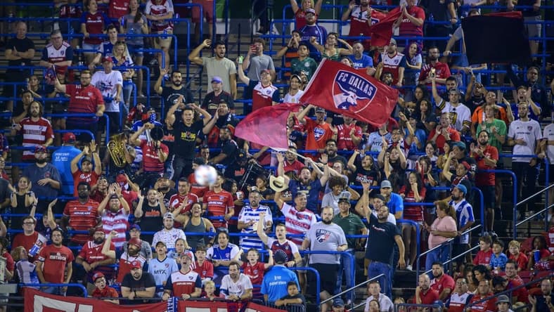 Aug 14, 2021; Frisco, TX, USA; The FC Dallas fans cheer for their team during the second half of the match against Sporting Kansas City at Toyota Stadium. Mandatory Credit: Jerome Miron-USA TODAY Sports