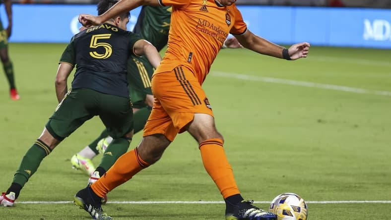 Sep 3, 2021; Houston, Texas, USA; Houston Dynamo FC forward Mateo Bajamich (7) controls the ball against the Portland Timbers during the second half at BBVA Stadium. Mandatory Credit: Troy Taormina-USA TODAY Sports