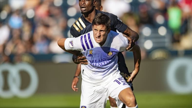 Sep 19, 2021; Philadelphia, Pennsylvania, USA; Orlando City defender Rodrigo Schlegel (15) fights for position in the box against the Philadelphia Union during the first half at Talen Energy Stadium. Mandatory Credit: John Jones-USA TODAY Sports