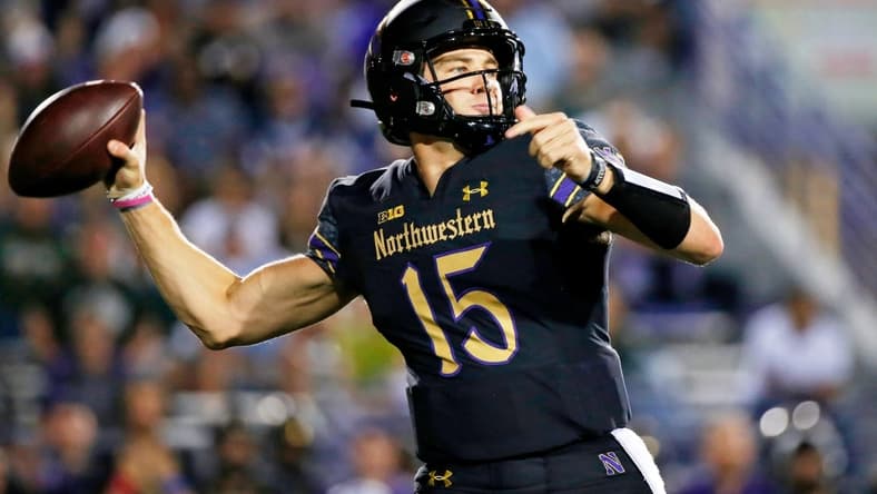 Sep 3, 2021; Evanston, Illinois, USA; Northwestern Wildcats quarterback Hunter Johnson (15) passes the ball against the Michigan State Spartans during the first quarter at Ryan Field. Mandatory Credit: Jon Durr-USA TODAY Sports
