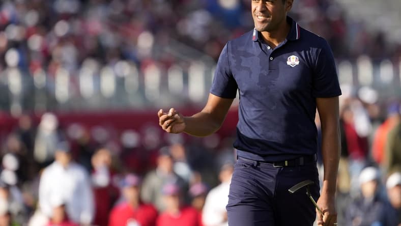 Sep 25, 2021; Haven, Wisconsin, USA; Team USA player Tony Finau reacts to his putt on the 15th green during day two four-ball rounds for the 43rd Ryder Cup golf competition at Whistling Straits. Mandatory Credit: Michael Madrid-USA TODAY Sports