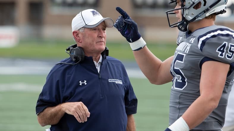 Monmouth Head Coach Kevin Callahan talks with Remi Johnson during break in first half action. Monmouth University Football vs Princeton on October 9, 2021 in West Long Branch, NJ.
Mufb211009i