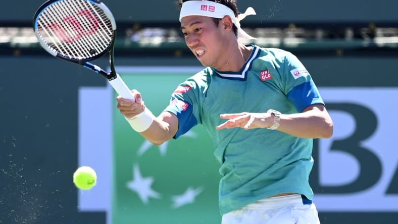 Oct 9, 2021; Indian Wells, CA, USA;  Kei Nishikori (JPN) hits a shot during his second round match against Daniel Evans (GER) during the BNP Paribas Open at the Indian Wells Tennis Garden. Mandatory Credit: Jayne Kamin-Oncea-USA TODAY Sports