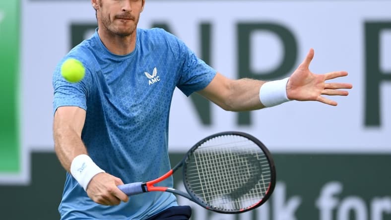 Oct 12, 2021; Indian Wells, CA, USA; Andy Murray (GBR) hits a shot against Alexander Zverev (GER) during a third round match in the BNP Paribas Open at the Indian Wells Tennis Garden. Mandatory Credit: Jayne Kamin-Oncea-USA TODAY Sports