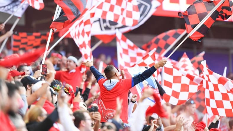 Oct 17, 2021; Harrison, New Jersey, USA; New York Red Bulls fans celebrate the 1-0 win over New York City after the match at Red Bull Arena. Mandatory Credit: Dennis Schneidler-USA TODAY Sports