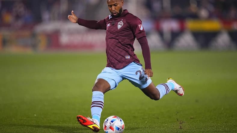Oct 20, 2021; Commerce City, Colorado, USA; Colorado Rapids midfielder Kellyn Acosta (23) prepares to kick the ball in the first half against the Seattle Sounders at Dick's Sporting Goods Park. Mandatory Credit: Ron Chenoy-USA TODAY Sports