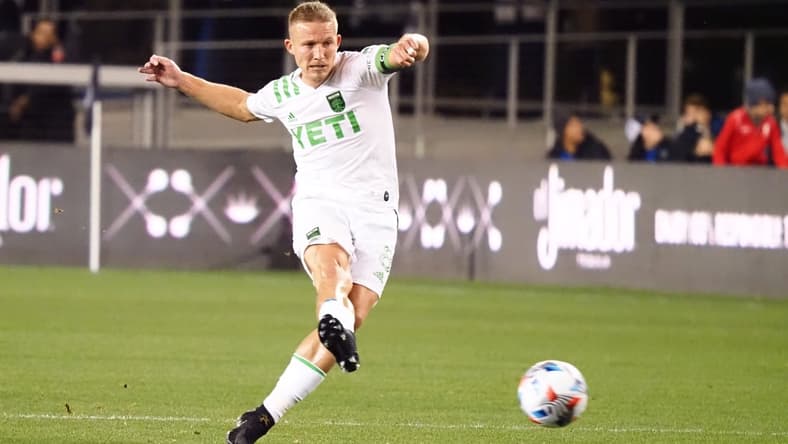 Oct 20, 2021; San Jose, California, USA; Austin FC midfielder Alex Ring (8) passes the ball against the San Jose Earthquakes during the first half at PayPal Park. Mandatory Credit: Kelley L Cox-USA TODAY Sports
